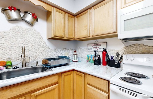 Ocean Pines House | Canalside Home in North Ocean Pines with Dock, Screened Porch, WiFi & AC