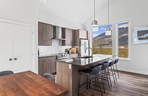Three Sisters Mountain Village Condo | Canmore: 3BR Condo in Stewart Creek with Garage