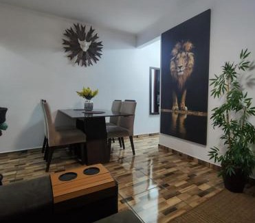 Ocian Apartment | Cantinho na Ocian a 50 metros do mar e próximo a feirinha de artesanato da praia da Ocian ,Com NET Flix Globo play internet vivo com 500 megas Tv de 70 polegadas com ar condicionado