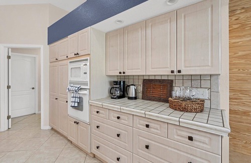 Fort Myers House | Cape Coral 3-Bedroom Canalfront Pool Vacation Home with Dock