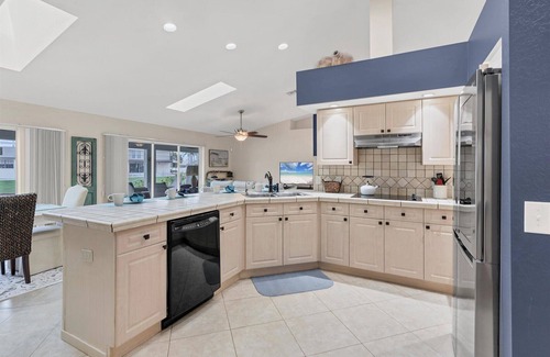 Fort Myers House | Cape Coral 3-Bedroom Canalfront Pool Vacation Home with Dock