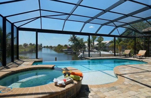 Pelican Apartment | Cape Coral, Pelican,4/3.5,family-friendly, West-Exp. sunset views,saltwaterCanal