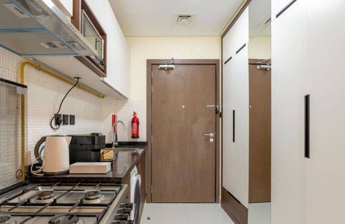 Dubai Apartment | Capital Stay - Cozy Studio in Liwan Dubai