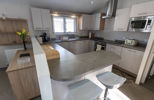 Mudeford House | 'Captain's Lodge' - a luxury lodge by the beach on Sandhills Holiday Park, Mudeford