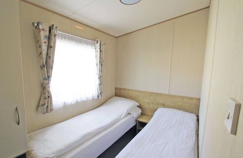Alford House | Caravan with one double and two twin.