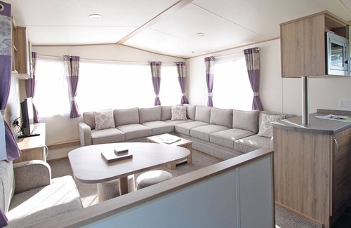 Alford House | Caravan with one double and two twin.