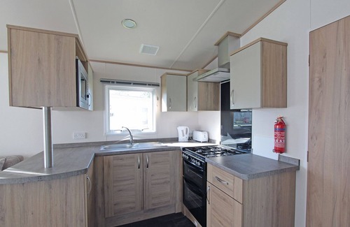 Alford House | Caravan with one double and two twin.