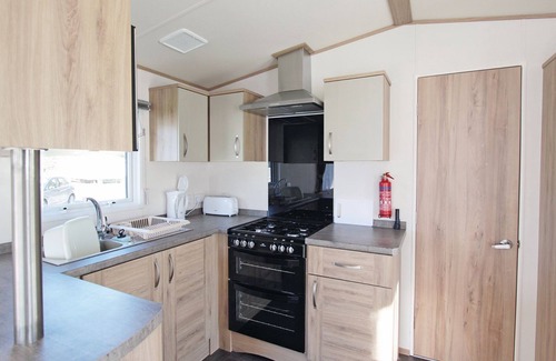 Alford House | Caravan with one double and two twin.