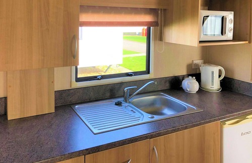 Chapel Saint Leonards House | Caravan with one double and one twin.
