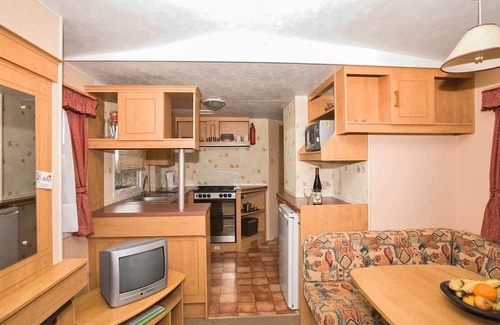Sandown House | Caravan with one double and one twin.