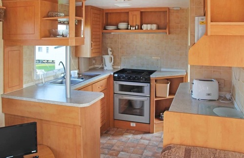 Sandown House | Caravan with one double and one twin.
