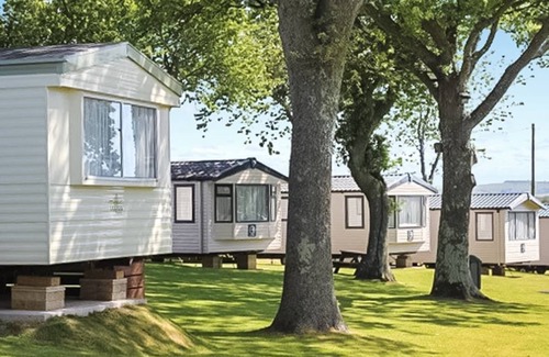 Sandown House | Caravan with one double and one twin.