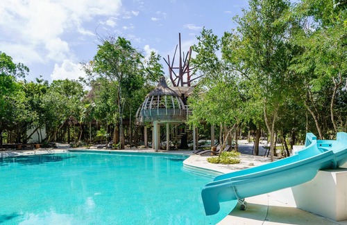 Puerto Morelos House | Casa Barbara is a peaceful setting, abundance of vegetation in the gated community of Aldea K'iin.