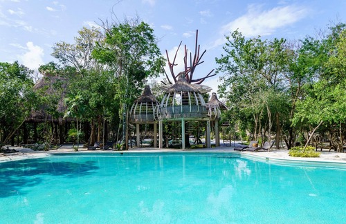 Puerto Morelos House | Casa Barbara is a peaceful setting, abundance of vegetation in the gated community of Aldea K'iin.