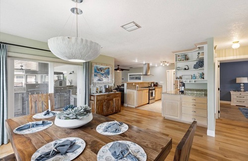 Cocoa Isles Country Club House | Casa Coco Retreat w/Heated Pool & Outdoor Kitchen!