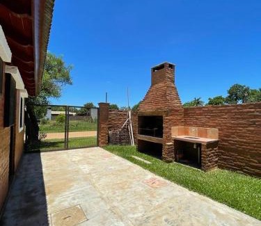 Paso de la Patria House | Casa con Pileta a Cuadras de la Playa