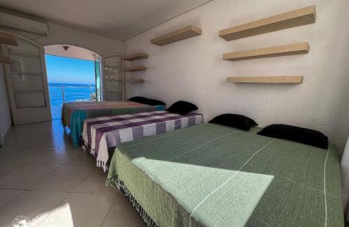 Praia de Borrifos House | Casa costeira com vista e área gourmet no Borrifos