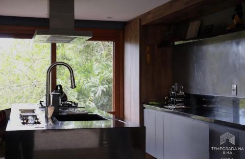 Praia do Rosa Villa | Casa de praia no Rosa - vista para Lagoa de Ibiraquera