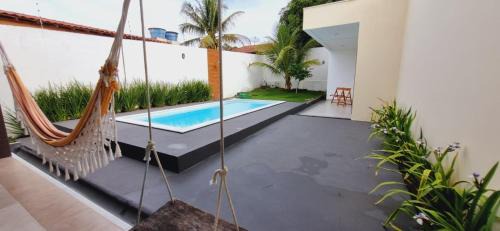 Porto Seguro House | Casa em Taperapuan com 3 Suítes e Hidromassagem