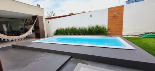 Porto Seguro House | Casa em Taperapuan com 3 Suítes e Hidromassagem