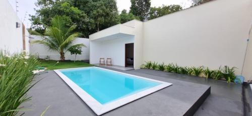 Porto Seguro House | Casa em Taperapuan com 3 Suítes e Hidromassagem
