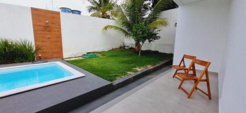 Porto Seguro House | Casa em Taperapuan com 3 Suítes e Hidromassagem
