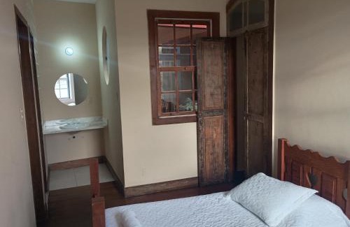 Ouro Preto Hotel | CASA RAIZ cama café e prosa