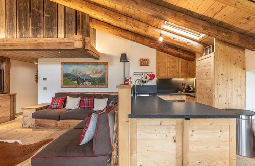 Cortina d'Ampezzo Apartment | Casa Verocip, a panoramic attic with a view of the Dolomites