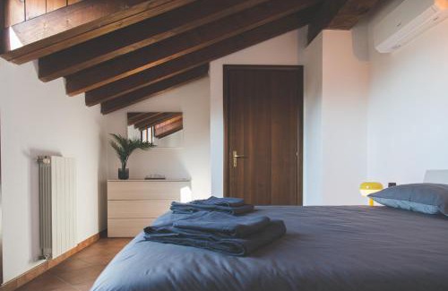 Bressana Bottarone Apartment | Castelletto - Armonia rustica e moderna