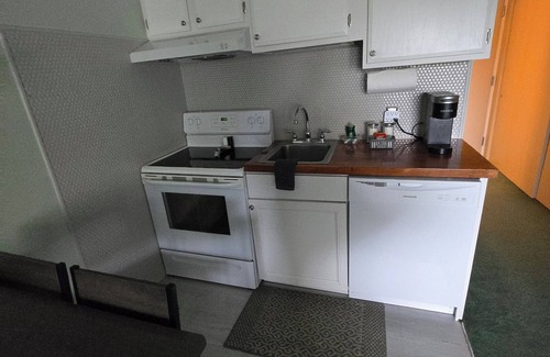 Weirs Beach Apartment | Cedar Lodge Condo Balcony and Full Kitchen