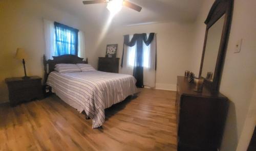 Lumberton Apartment | Central located large home on quiet wooded street