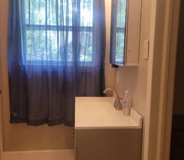 Lumberton Apartment | Central located large home on quiet wooded street