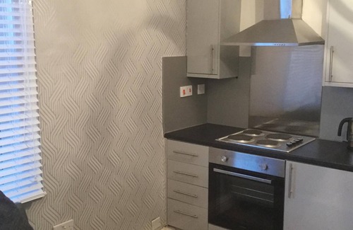 Smethwick House | Central Stylish Townhouse 3 separate flats in single block for upto 10 people