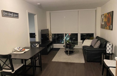 Surrey Condo | Centrally located, 30 plus floor Rocky Mountains view 1 BR Condo