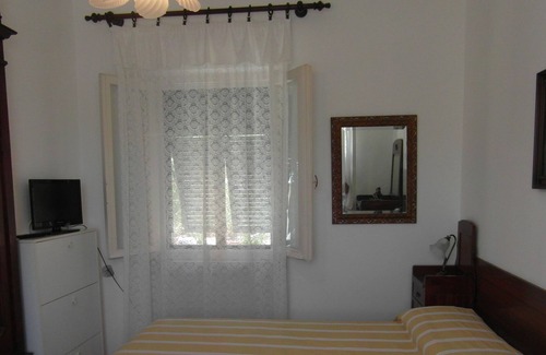 Lido di Capoliveri House | Centrally Located and Mediterranean Holiday Home "Margherita - Trilocale" with Garden