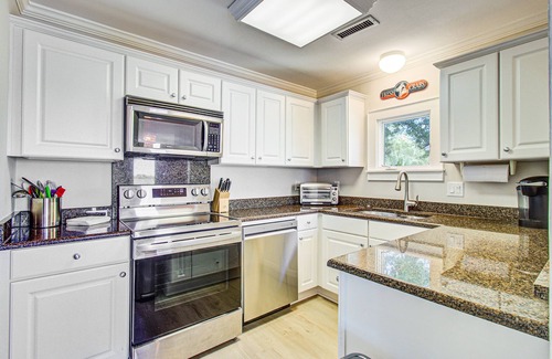 Marsh Island House | Centrally located to local attractions, close to beach access & marsh views