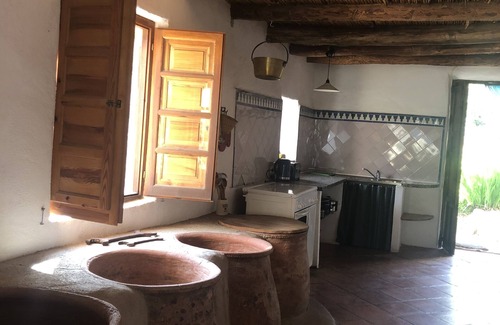 Agustinos House | Century-old olive mill has a unique style with open and light spaces