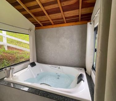 Paraisopolis House | Chalé pedra branca