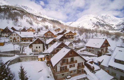Vaujany Ski Chalet | Chalet Dibona, cosy log fire evenings 200m from the slopes, by Ski Peak