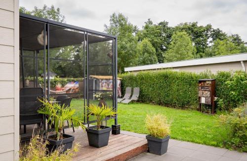 Heinkenszand Ski Chalet | Chalet Hart van Zeeland met overdekt terras & natuur VP086