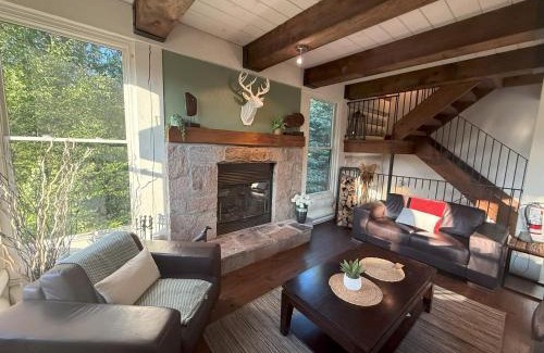 Lac Superieur Village Ski Chalet | Chalet Inukshuk Luxury Log Cabin with Spa Lake View and Club Access near Mont Tremblant