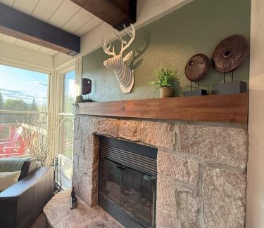 Lac Superieur Village Ski Chalet | Chalet Inukshuk Luxury Log Cabin with Spa Lake View and Club Access near Mont Tremblant