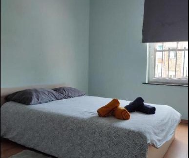 Collignon House | Chambre confortable lit double schaarbeek 1ere étage clé normal