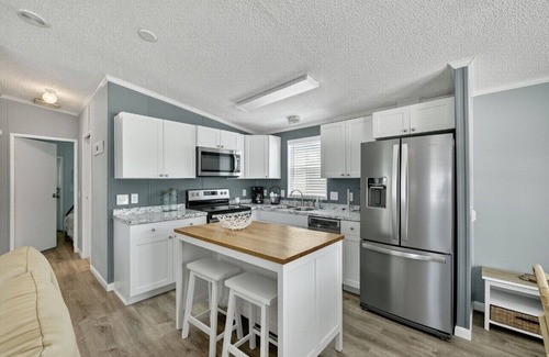 Hutchinson Island South House | Charming 2-bedroom, 2-bath beach house with private beach access, dog friendly.