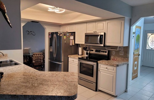 Port Charlotte House | Charming 3-bedroom house in Port Charlotte on canal with dock and private pool.