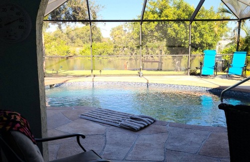 Port Charlotte House | Charming 3-bedroom house in Port Charlotte on canal with dock and private pool.