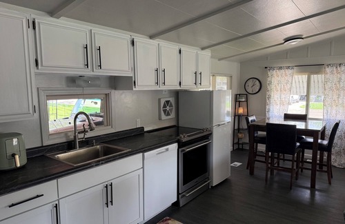 Plentywood House | Charming 3-bedroom house in Plentywood with game room and patio with BBQ.