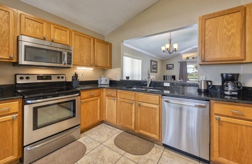 Lake Berkley Villa | Charming 3BR home in Kissimmee with private pool and lake view, perfect for families.