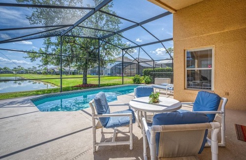 Lake Berkley Villa | Charming 3BR home in Kissimmee with private pool and lake view, perfect for families.