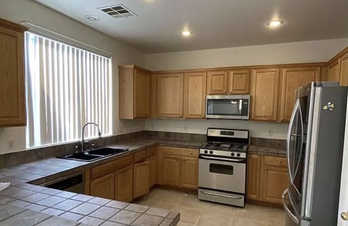 Rhodes Ranch House | Charming 4 Bedroom Home with Pool